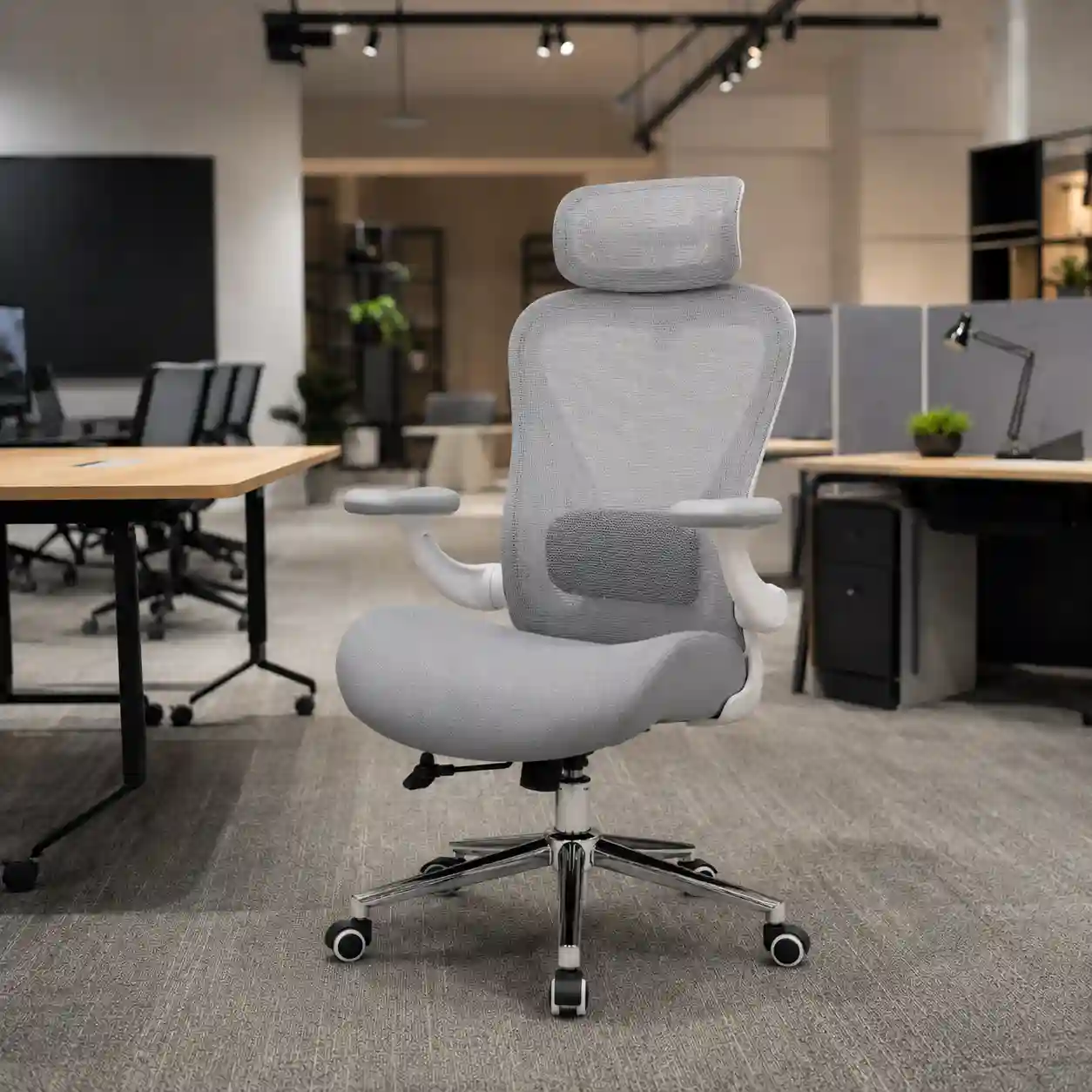 779 flip-up armrest office chair used for space-saving coworking and training room layouts