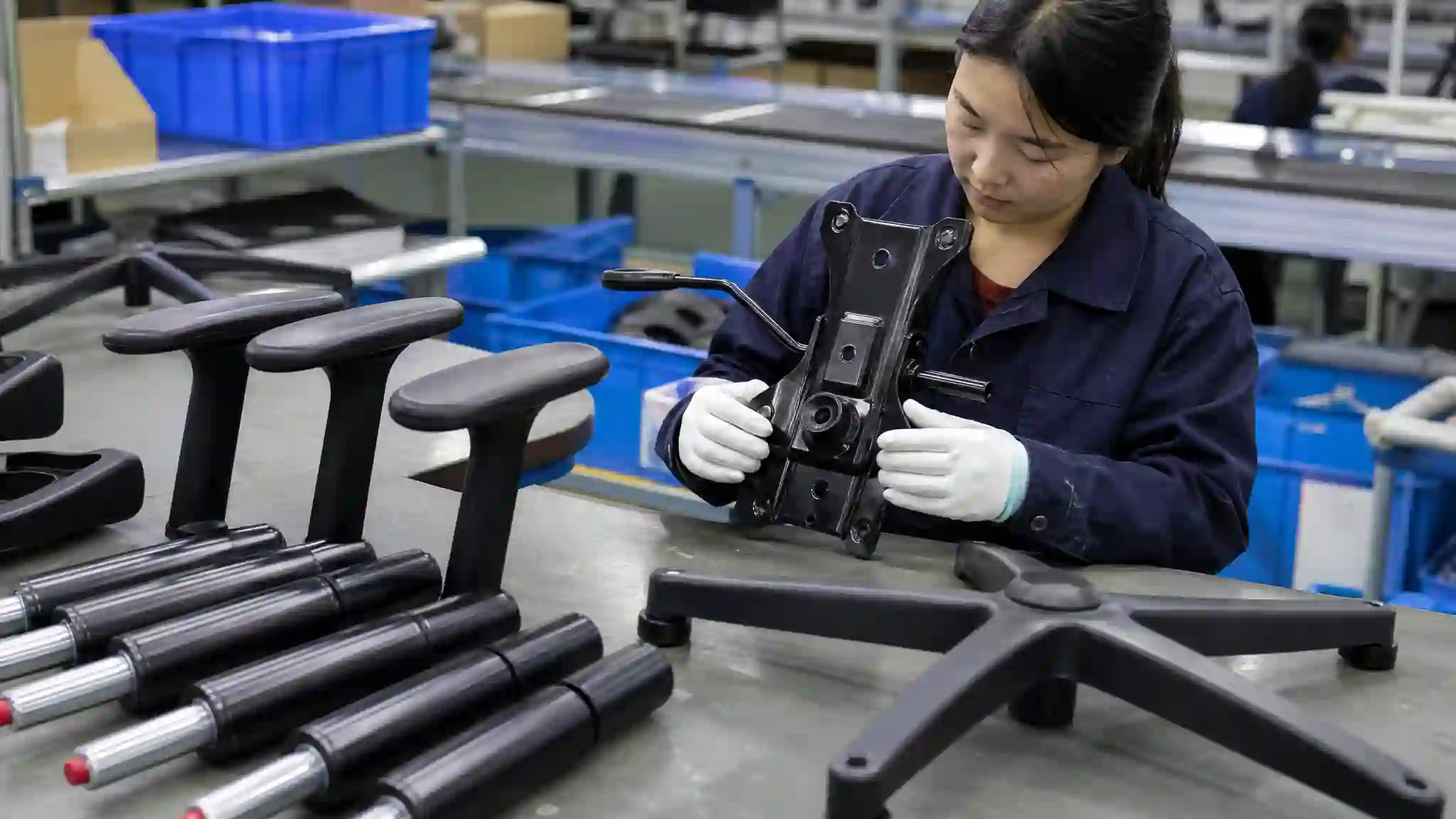 Gaming chair mechanism armrest and gas lift inspection before mass production