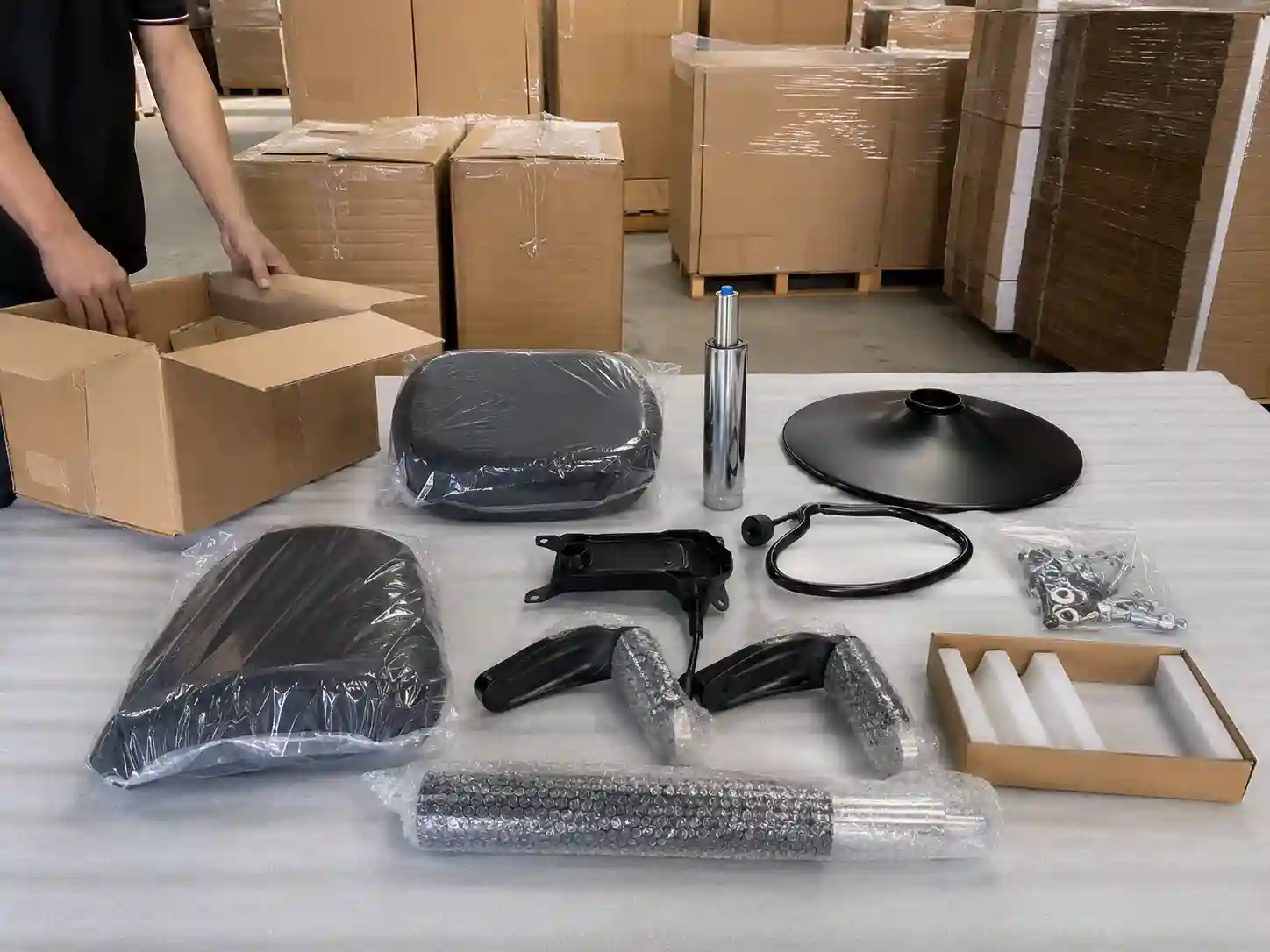 Bar stool export packing with protected gas lift base and hardware for bulk orders
