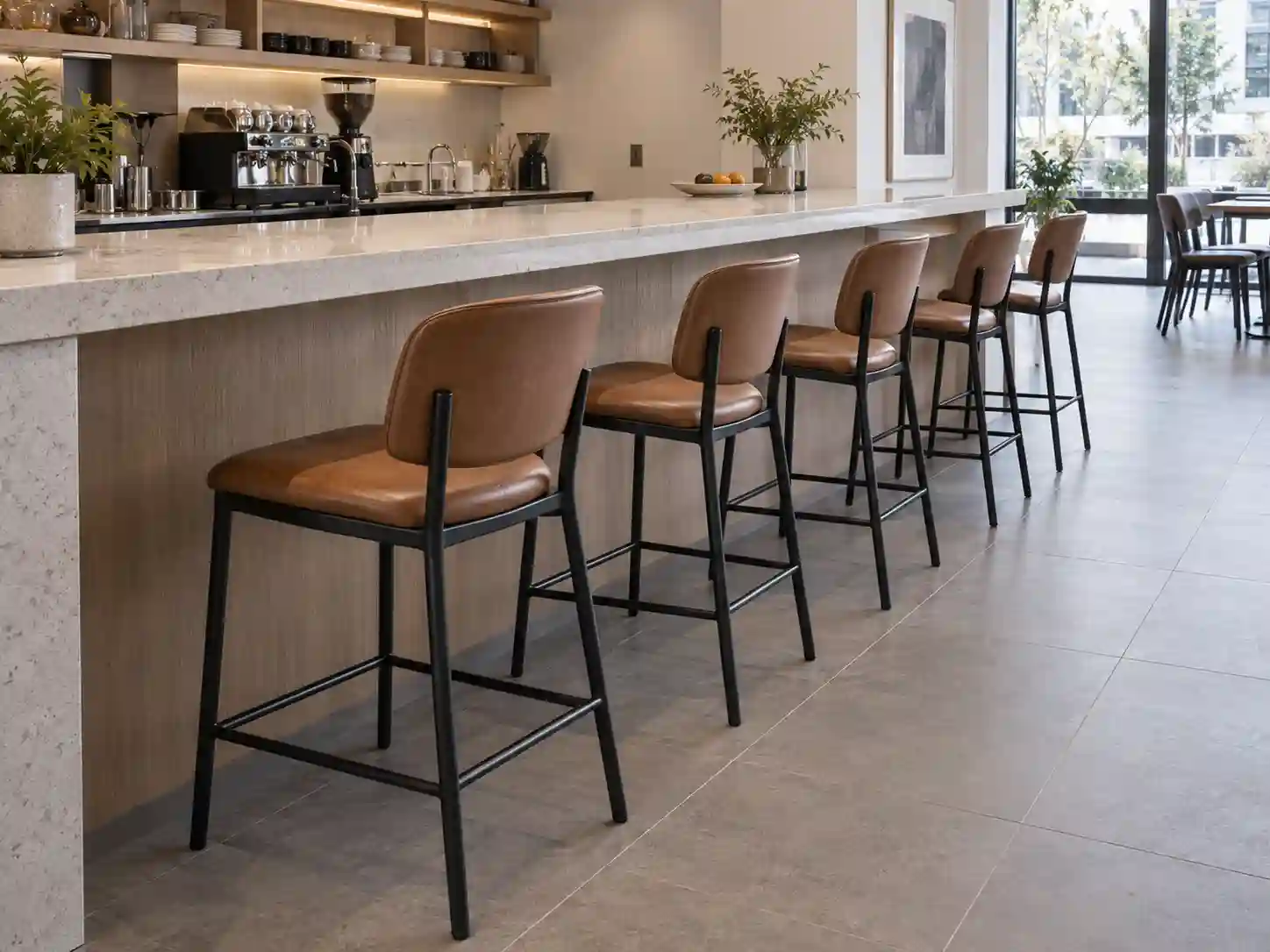 Commercial bar stools with backs spaced along a restaurant counter for seating layout planning