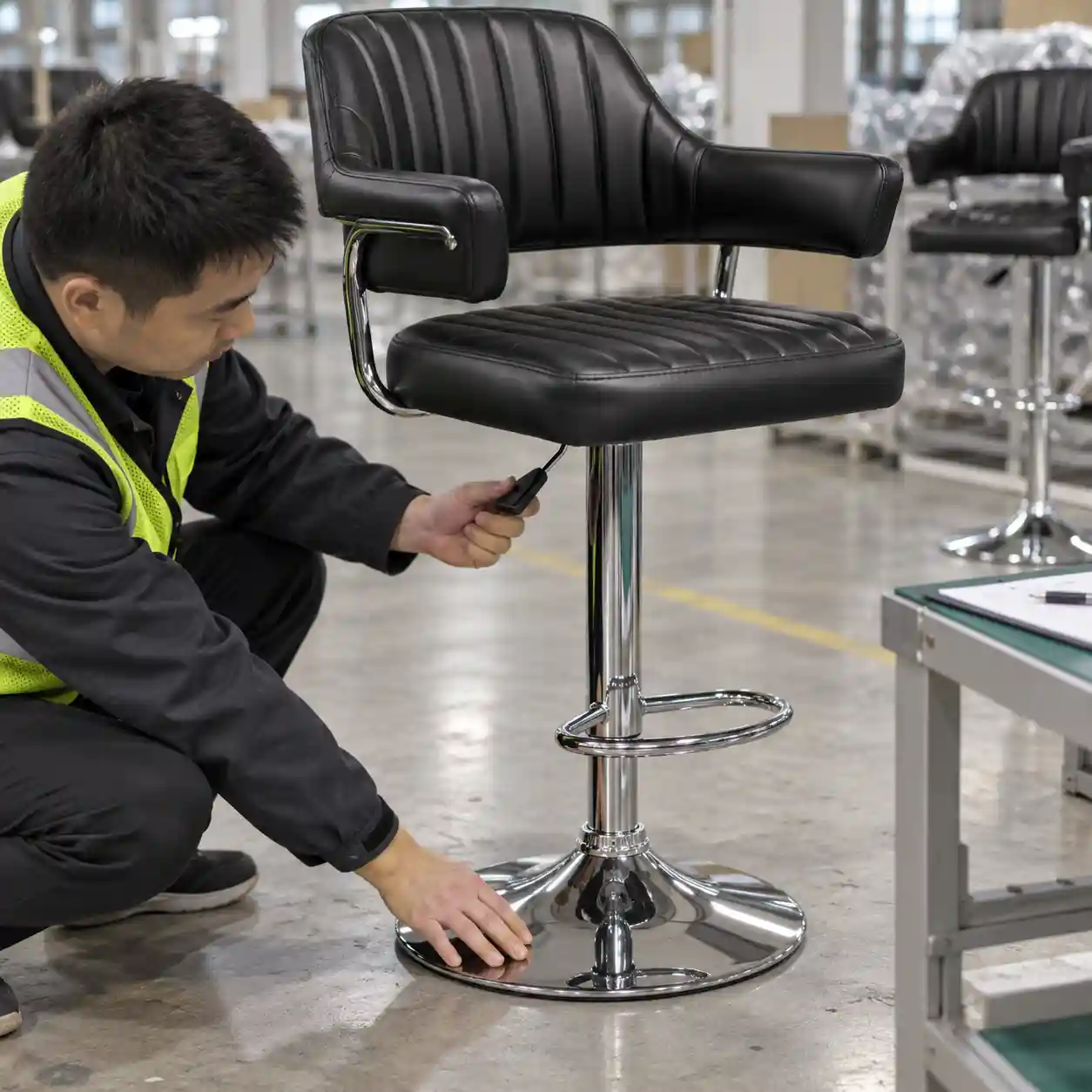 Testing gas lift movement and chrome base stability on an upholstered bar stool